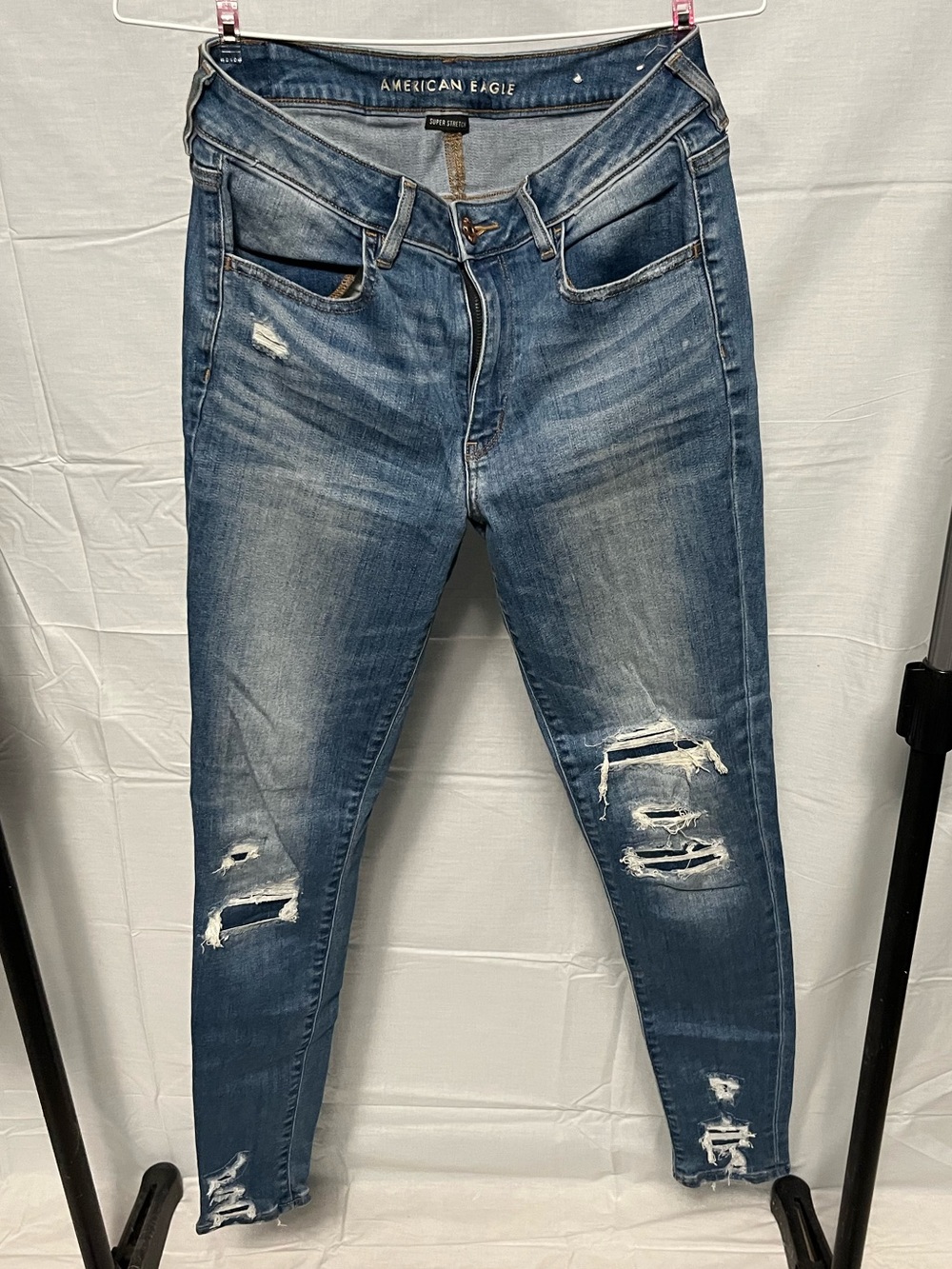 American Eagle Outfitters Distressed Medium Blue Jeggings.
Size 12 X-Long